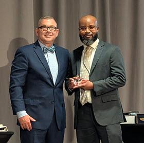 Stephen Horton presents Alan Garrett with the 2026 Rising Star Award